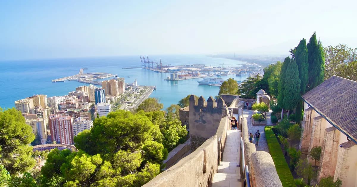 Gibralfaro Castle ramparts in Malaga with panoramic views over the port and Mediterranean Sea.